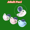 Close-up of a big pacifier for adults with a decorative charm, ideal for ABDL enthusiasts.